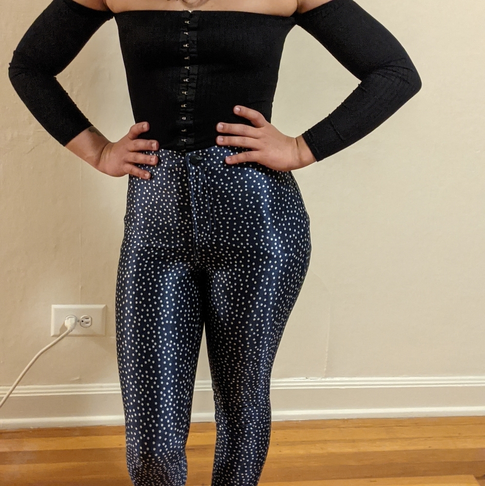 Navy blue disco pants with white polka dots